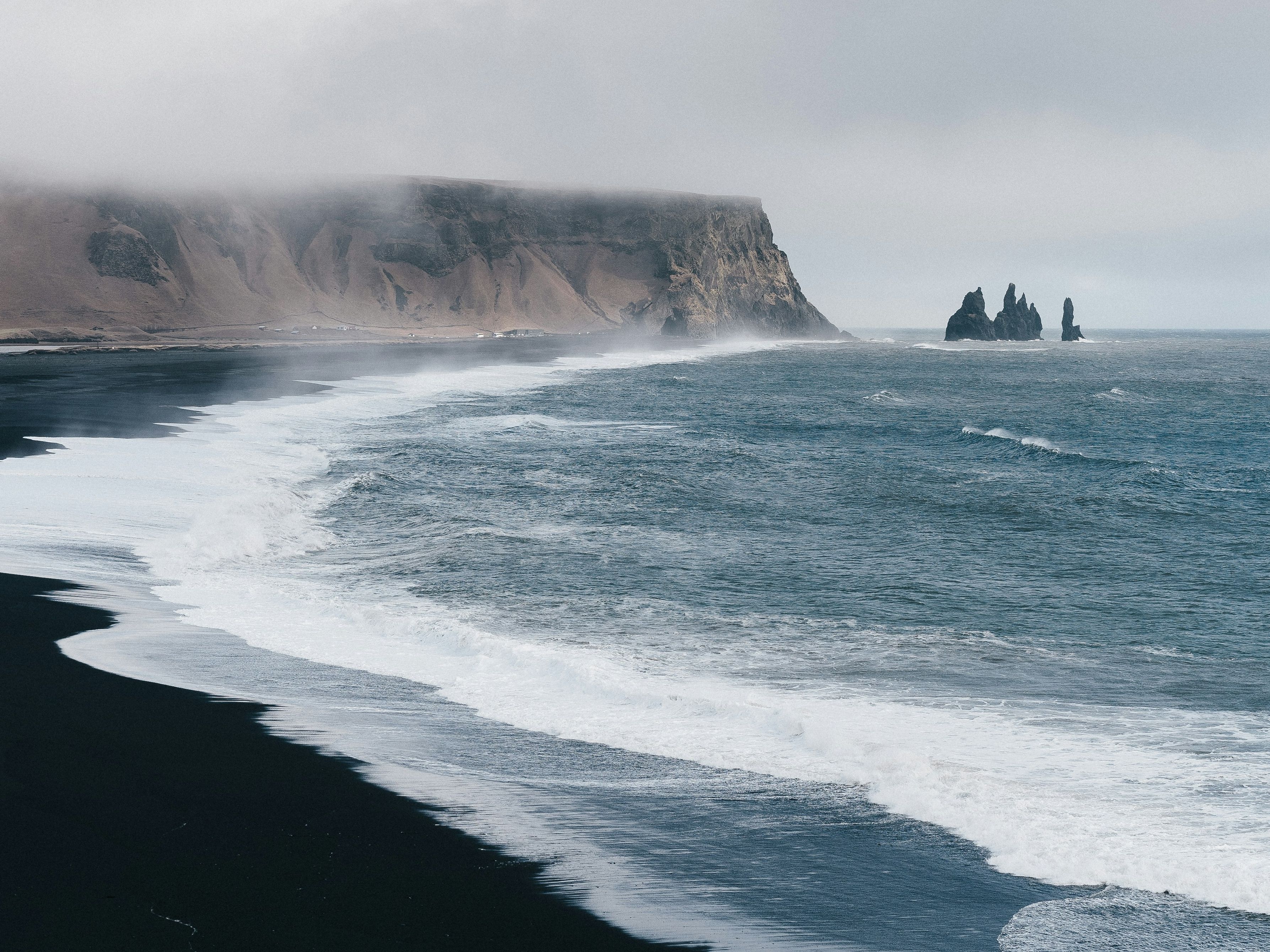 Beach with cloudy sky