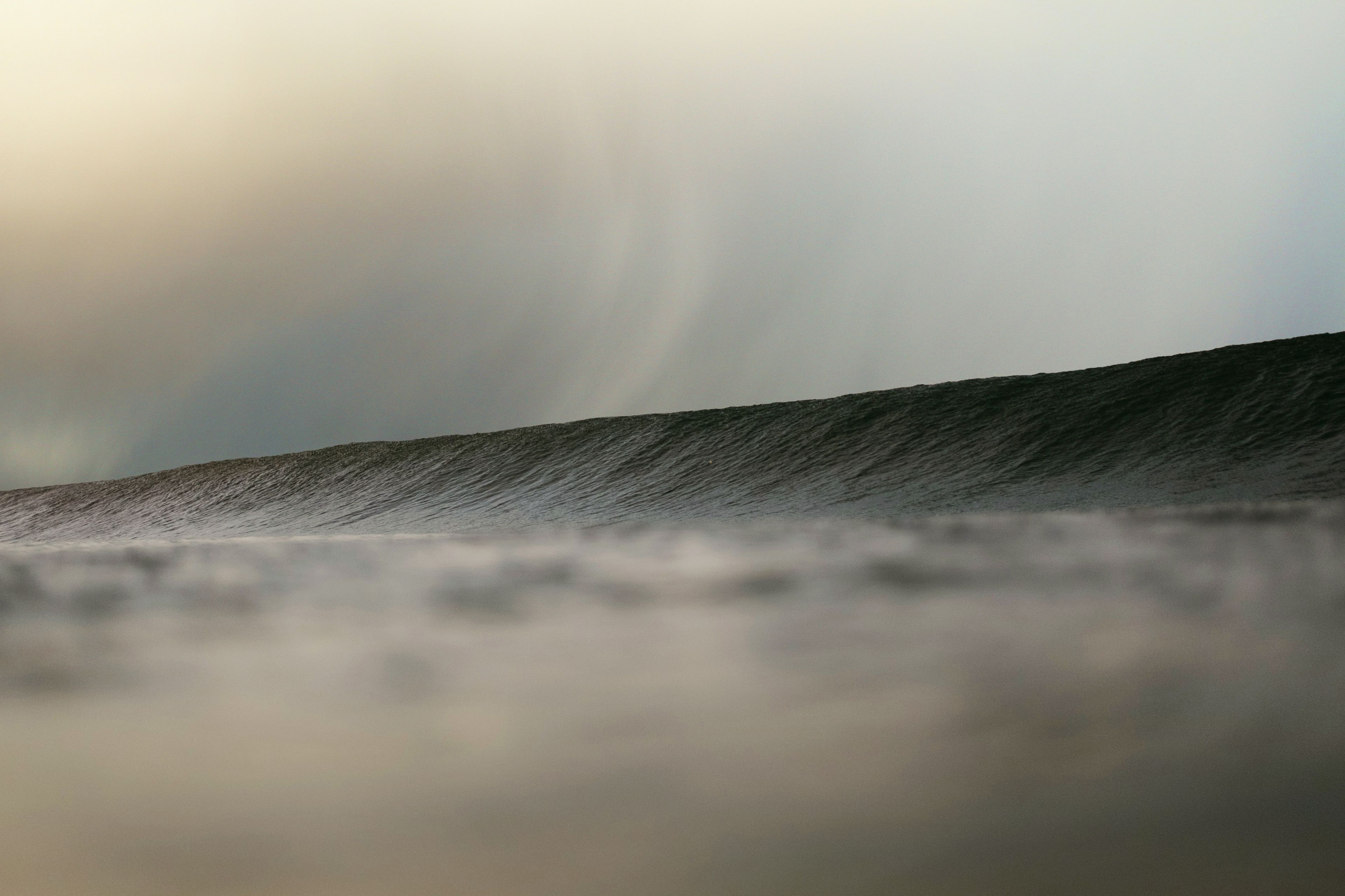 big waves under a gloomy sky