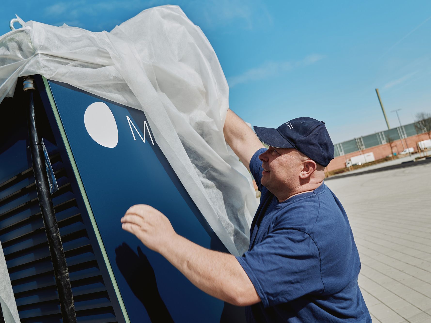 A man unpacks a POWER Charger