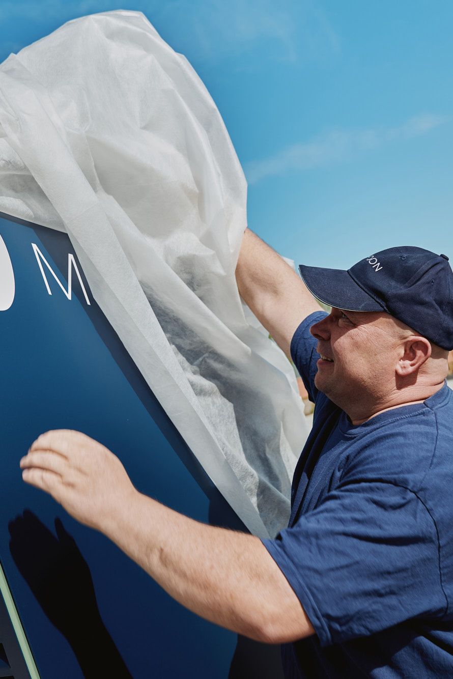 A man unpacks a POWER Charger