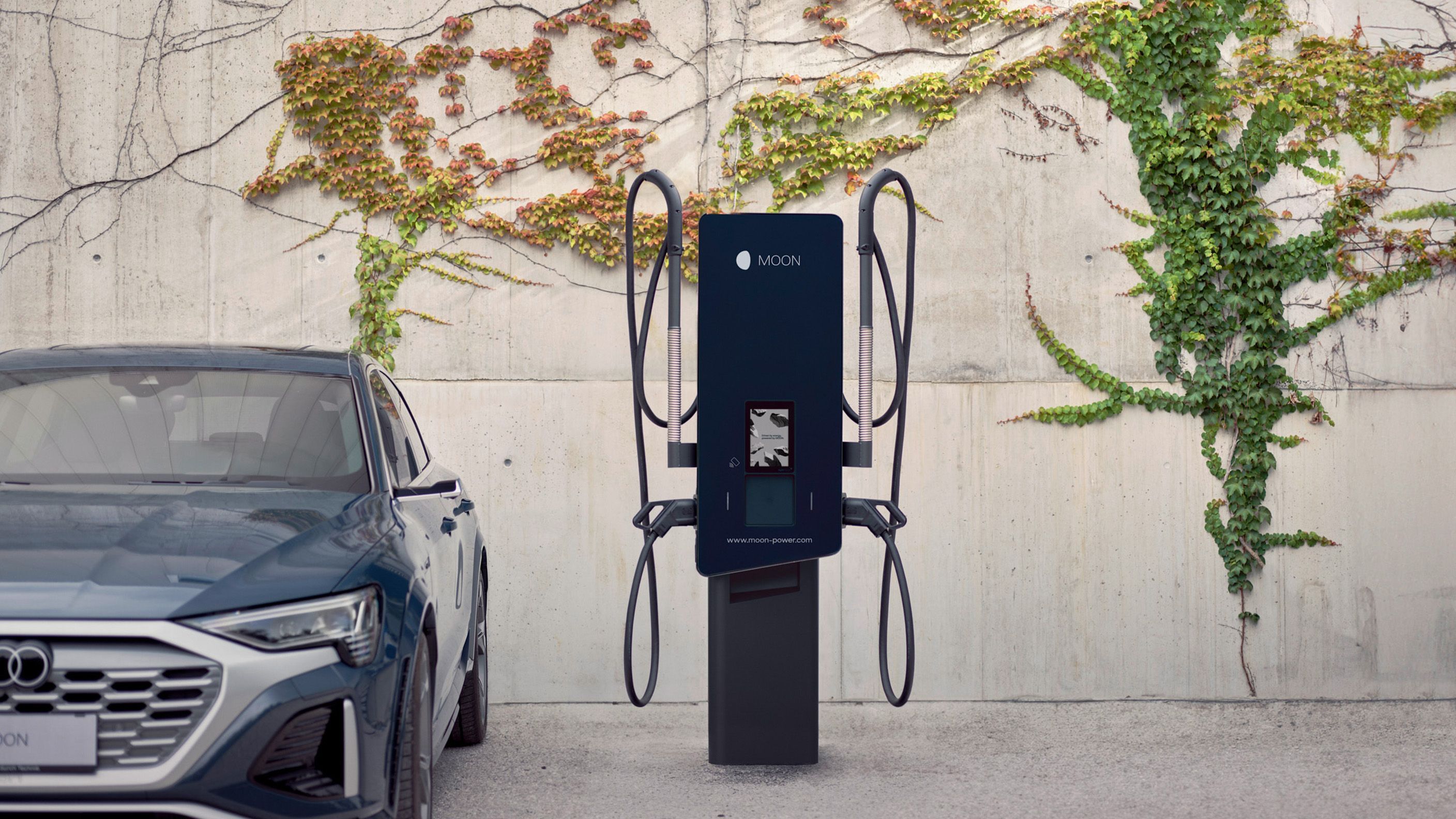 Charging station next to a car