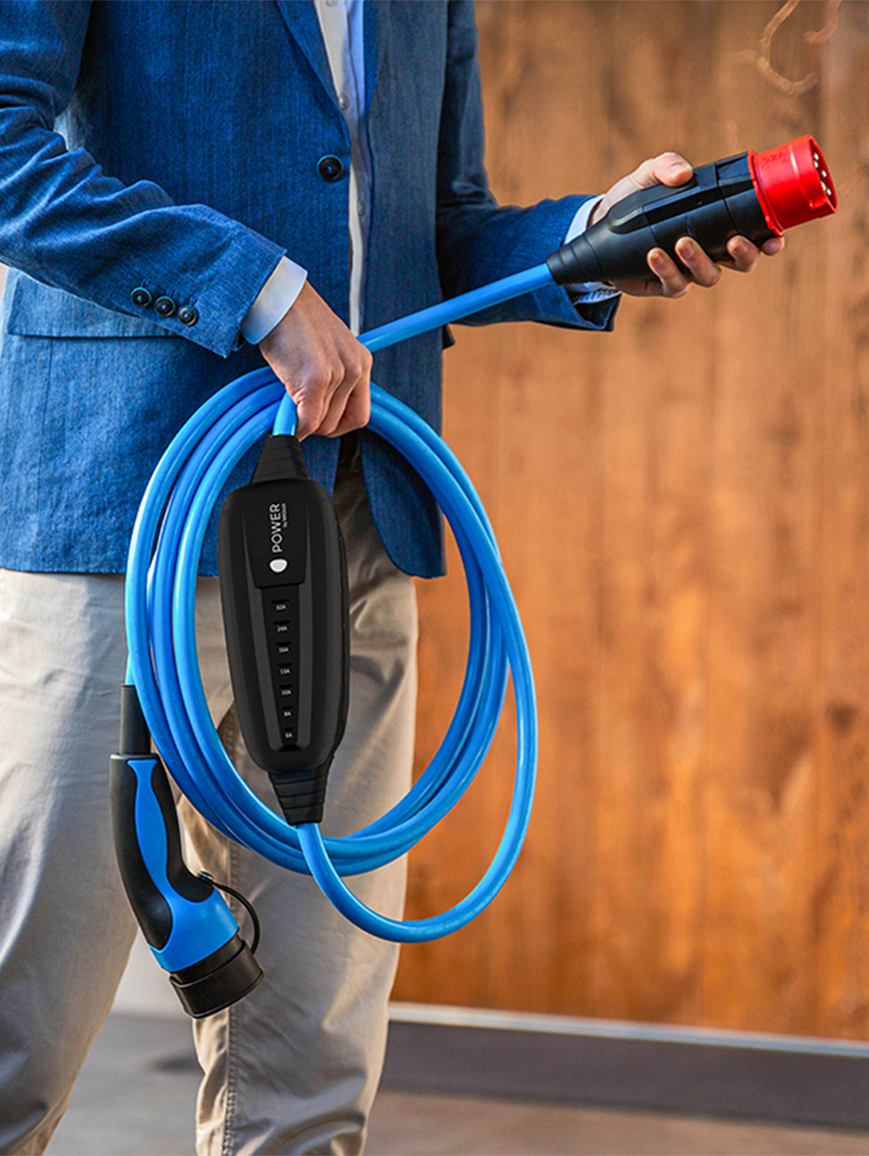 Person holding MOON charging cable